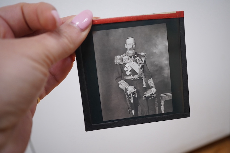 Two boxes of magic lantern slides to include Burnham Abbey and Windsor castle. Condition - fair